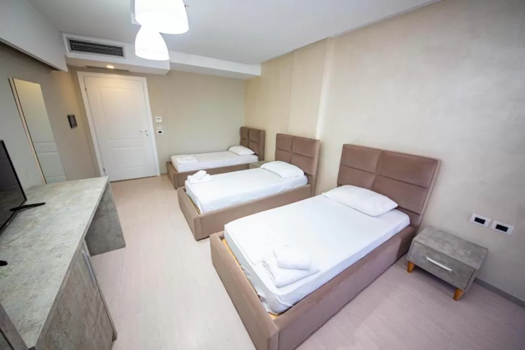 Miki 12 - STD TRPL 1.jpg